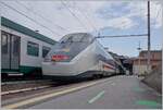 The FS Trenitalia IC 631 on the journey from Ventimiglia to Milano leaves Finale Ligure train station after a short stop.