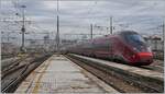 The the ntv  ITALO  ER 575 001 is leaving Milano Centrale.