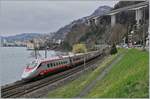 A FS Trenitalia ETR 610 on the way to Geneve by the Castle of Chillon.