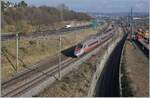 The FS Trenitalia ETR 610 003 on the way form Milano to Brig by Denges Echandens.