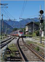 The FS Trenitalia ETR 610 003 on the way from Milan to Basel is arriving at Domodossola.