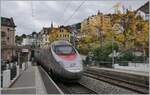 The FS Trenitalia ETR 610 003 on the way to Geneva is leaving Montreux.