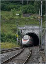 A FS Trenitalia ETR 610 from Milnao to Basel is arriving at Läufelfingen. 
(SBB Summertimetable). 

11.07.2018