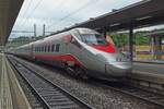 ETR 610 104 quits Spiez on 28 May 2019 with an EuroCity service to Basel SBB.