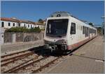 The ARST (Transporti Regionali della Sardegna) ADeS01 (95 83 4600 001-0 [A] / 95 83 4600 101-8 [B]) double railcar departs Alghero as AT 70 to Sàssari.