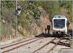 The ARST (transporti regionali della sardegna) ADeS01 (95 83 4600 001-0 [A] / 95 83 4600 101-8 [B]) double railcar has left Alghero station and is now running as AT 70 to Sàssari.