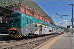 The Trenord ALe 711 068 (94 83 4 711 068-6 I-TN) is the service 46 to Milano Cadorna. 

27.09.2022