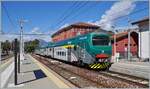 Terminus Station Laveno Mombello Lago: The Trenord ALe 711 068 (94 83 4 711 068-6 I-TN) comming from Milano Cadorna is arriving at the Laveno Mombello Lago Station.