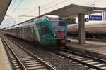 Multiple unit ETR 350 008 stops on the platform at Ferrara station.