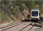 The arst (transporti regionali della sardegna) ADeS01 (95 83 4600 001-0 (A) / 95 83 4600 101-8 (B)) double railcar departs Alghero as regional train AT 70 to Sassari.

September 22, 2026