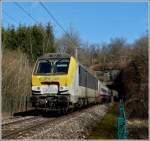 3004 is hauling the IR 113 Liers - Luxembourg City between the tunnels Bierden and Kautenbach on March 9th, 2012.