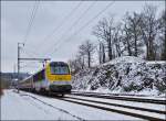 The IR 117 Liers - Luxembourg City is leaving the station of Wilwerwiltz on January 18th, 2013. 