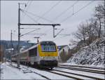 3011 is hauling the IR 117 Liers - Luxemmbourg City out of the station of Wilwerwiltz on January 18th, 2013.