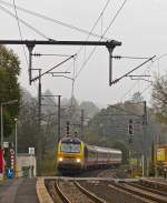 . 3003 is hauling the IR 111 Liers - Luxembourg City into the station of Wilwerwiltz on October 31st, 2014.
