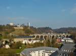 . The IC 117 Luxembourg City - Liers is running on the Pfaffental viaduct in Lucembourg City on March 23rd, 2015.