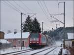 4004 is hauling the IR 3714 Luxembourg City - Troisvierges through Enscherange on December 7th, 2012.