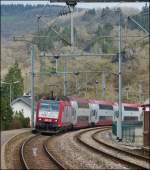 . 4012 is hauling the IR 3735 Troisvierges - Luxembourg City into the station of Kautenbach on April 20th, 2013.