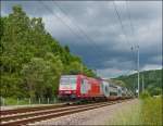 . 4020 is hauling the IR 3739 Troisvierges - Luxembourg City through Erpeldange/Ettelbrück on June 15, 2013.