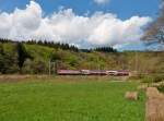. The IR 3712 Luxembourg - Troisvierges is running between Enscherange and Drauffelt on April 23rd, 2014.