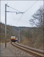 . The RB 3238 Wiltz - Luxembourg City is crossing the river Wiltz near Merholtz on March 8th, 2013.