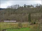 . The RE 3362 Wiltz - Kautenbach pictured while running along the castle of Wiltz on April 20th, 2012.