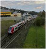 The RB 3244 Wiltz - Luxembourg City is leaving the station of Wiltz in the evening of April 13th, 2012.