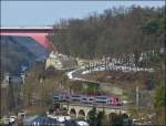 . The RB 3213 Luxembourg City - Wiltz is running on the viaduct of Grünewald in Luxembourg-Pfaffental on March 15th, 2013.