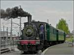 The steam engine AL-T3 6114 with heritage wagons is waiting for passengers at Pétange on May 1st, 2010.