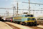 With + 11, NMBS 2014 with EC to Bruxelles-Midi leaves Luxembourg Gare Central on 24 July 1999.