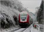 The RB 3238 Wiltz - Luxembourg City is arriving in Kautenbach on the cold December 25th, 2007.