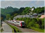 A push-pull train as local train 3241 Wiltz - Luxembourg City is running through the Sûre valley in Michelau on May 1st, 2011.