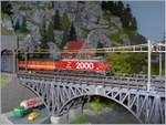 The Märklin mini club SBB Re 4/4 IV with an EC on the  Musel  Bridge.