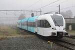 Arriva Friesland 326  M.C. Escher   shows the new colours for the northern concessions of Arriva at Blerick on 16 December 2021.