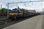 When ex-ACTS (now HUSA) 6005 shunted some autotransporter wagons for the EETC to Livorno, it started to pour at 's Hertogenbosch on 24 May 2013. Shortly after the shunt was completed, the sun broke through...