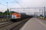 LOCON 220 with the refuse train 50094 runs through 's Hertogenbosch on the evening of 31 May 2013.