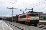 LOCON 9904 hauls a refuse train at 's Hertogenbosch on 4 July 2014.