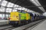 RF (Rail Feeder) 21 with railway engineering train at Amsterdam Centraal on 24 October 2009.