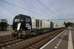 RFO 1604 hauls a container train through Blerick on 28 May 2021.