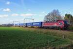 RFO 193 627 hauls the Katý intermodal shuttle train through Hulten on 23 February 2022.