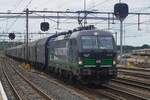 On 1 August 2026 RFO 193 955 hauls a steel train from Beverwijk through Amersfoort -not via track 1 as is normally the case with eastbound freights passing through Amersfoort but through the waiting tracks.