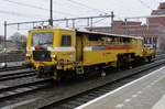 Strukton 09-32 passes through Amersfort on a rainy 25 February 2017. 
