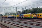 On 11 November 2019 Strukton 1824 'NICOLE' shunts two Gottwald rail engineering cranes at Nijmegen.