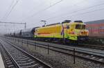 The cereals wagons behind Strukton 1756 be best closed at Oss on a very rainy 29 December 2021!
