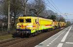 Strukton 1756 hauls a railway engineering train through Tilburg-Universiteit on 31 March 2021.