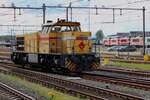 Strukton 303001 runs light through Amersfoort on 21 April 2024.