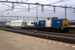 Volker Rail working train BUTCH is hauled out of Nijmegen by 203-4 on 2 August 2012.