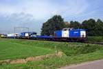 Volker Rail 203-4 hauls an engineering train through Hulten on 16 August 2019.