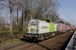 CapTrain CT-102 hauls a container train throguh Tilburg Universiteit on 31 March 2021.