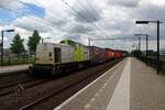 CapTrain's 203 104 hauls the Geleen-intermodal shuttle train through Tilburg-Reeshof on 7 July 2021.