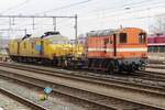 On 20 February 2023 RFO 9702 -still in the colours of her former owner LOCON- shunts a diagnostical train at Amersfoort.